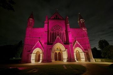 St Albans Cathedral lit up pink