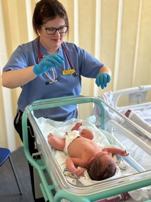 Faith doing a newborn screening.jpg