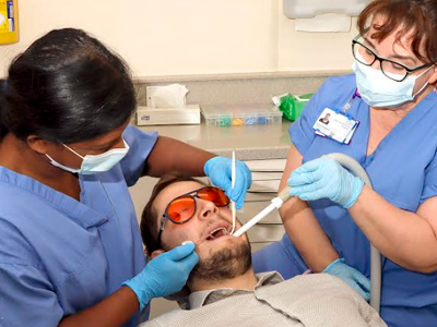 Picture of a dentist working on a patient