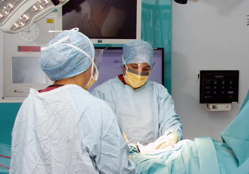 Picture of two surgeons in an operating theatre